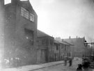 North Church Street towards West Bar (four storey building on junction with Hicks Lane). Entrance to Court 3, left (with children gathered outside)