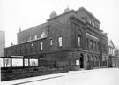 Public Library (Central Lending Library and Reading Room), formerly the Music Hall, Surrey Street. United Methodist Church in background