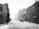 Surrey Street from Eyre Lane. Old School of Medicine occupied by Army Recruiting Offices, foreground. United Methodist Church and Public Library (Central Lending Library and Reading Room), formerly the Music Hall, in background