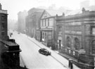 Surrey Street from Arundel Street. Old School of Medicine occupied by Army Recruiting, foreground. United Methodist Church, centre. Public Library (Central Lending and Reading Room), formerly the Music Hall and former Mechanics' Institute, rear