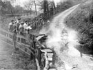 Taking the water splash in the Hallamshire Motor Cycle Trials, near Bamford, pre World War II