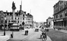 Moorhead and Crimean Monument, looking towards South Street, Moor. T. and J. Roberts, (later became Roberts Brothers), Drapers, right. Moorhead Brewery and Grapes Hotel, Thomas Berry and Co. Ltd., left