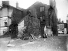 Rear of Crown and Anchor public house, No. 218 Fitzwilliam Street, after the demolition of terraced houses adjoining. Remains of terraced houses fronting Button Lane, left