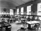 View: u02881 Stands in the newspaper reading room, showing method of swivel and individual lighting, Firth Park Branch Library, Firth Park Road