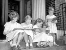 View: u02896 Young readers on the steps of Firth Park Branch Library, Firth Park Road