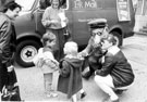 View: u02933 Children meeting Postman Pat outside Firth Park Branch Library,  Firth Park Road