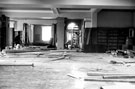 View: u02986 Interior of Hillsborough Branch Library, Middlewood Road, Hillsborough Park, showing new floors, wireing, etc. Joiner on left is boxing in new support girders, plasterer on right. Formerly Hillsborough Hall