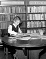 View: u03012 Child preparing the Children's Magazine, which received contributions from the young readers at Hillsborough Junior Library, Hillsborough Library, Middlewood Road, Hillsborough Park. Opened 3rd December, 1929, cost ú1,772. Formerly Hillsboroug