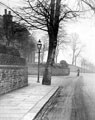 Clarkehouse Road at junction of Ash Grove. Wall in background belongs to King Edward VII School