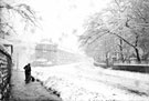 Snow clearing on Clarkehouse Road (taken from the junction with Glossop Road)