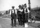 Workmen with a Tar Boiler