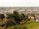 View across Parkway business area, the row of shops just in sight on the far right is Manor Lane