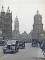 View: u06338 Pinstone Street looking towards St. Paul C. of E. Church (right); Stewart and Stewart Ltd., tailors at the junction with Cross Burgess Street and the Town Hall in the background