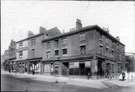 View: v00290 Nos. 102 - 114 Barkers Pool at junction of Pool Square, right. Premises include No. 102 Thomas Cocking and Sons, accountants, No. 112 White Lion Hotel and No. 114 John Hoyland and Son piano dealers left