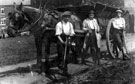 View: v00775 Muck spreading on William Maycock's farm on Fife Street (formerly Fowler Street), Ronnie Ball and his brother with Eddie Maycock leaning on the cart-wheel, Jedburgh Street in the background
