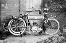 Trumph Motorbike in the yard of 1 Jedburgh Street, Wincobank, probably belonging to one of the Maycock family