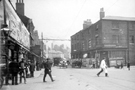 View: v00974 Gibraltar Street at the junction with Trinity Street (right), Nos. 221 - 231 Nichols and Co., wholesale grocers on corner the corner