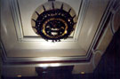 Cutlers Company Coat of Arms depicted on a light fitting on the ceiling of the main stairs, Cutlers Hall, Church Street