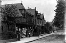 Nether Edge Road showing the Post Office, run by the Holt family and Hubbard's Drapery shop