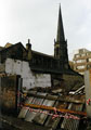 Demolition of property on Backfields looking towards St. Matthews Church and Eagle Star House, Carver Street