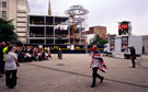 Fans watching the England vs Brazil World Cup match on a big screen in Tudor Square