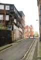 Bailey Lane looking towards West Street showing derelict La Luna restaurant and Morton Scissors, scissors manufacturers