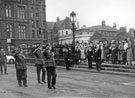 View: v03264 Wing Commander Ken A. Mummery, R.A.F. Norton saluting the Lord Mayor J. Curtis, outside the Cathedral during Battle of Britain Day March with Sally Mummery his wife 4th from the right next to the Lady Mayores