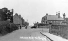 Hollinsend Road at the junction with Ridgeway Road with Gleadless, Hollinsend and Intake War Memorial visible on the on the right