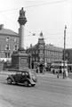 Crimean Monument, Moorhead with Public Benefit Boot Company (left) and Newton Chambers, Newton House, in background