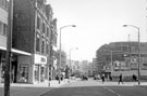 Pinstone Street looking towards The Moor with H.H.B. Sugg Ltd., sportswear left