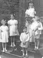 May Queen Jean Lawson and attendants taken on the steps of the 'ladies room' at Montgomery Methodist Chapel, corner of Oakdale Road/Union Road