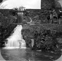 Photographers at Shepherd (Porter Wheel) Wheel, Whiteley Woods, situated in what is now Bingham Park. Last remaining cutlers' wheel. There was a wheel on this site in 1584. Mr. Shepherd connected with wheel in 1794.