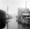 River Don from Lady's Bridge before the First World War. Tennant Brothers Ltd., Exchange Brewery on left (fronting Bridge Street), Millsands Steelworks beyond and Cocker Brothers Wireworks, right