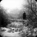 Wooden bridge near a water mill, similar to bridge at Shepherd Wheel