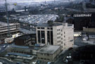 Elevated view of market area. Sheffield Transport Offices in foreground. Victoria Station Road and Furnival Road, left. Victoria Quays, background, right