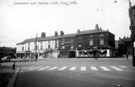 Premises on Button Lane from Furnival Street, Moorhead, centre, The Moor, left, (foreground), Nos. 18 - 20 Roberts Brothers Ltd., No. 22 Angel Inn, No. 24 Evans and Green, confectioners, No 26, Skidmores, pork butchers