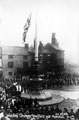 View: y00578 Sheffield War Memorial, Barkers Pool, unveiling ceremony, premises in background include No 115 and 117, F.W. Farrer, Leather Merchant