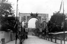 View: y00673 Decorative arch on Glossop Road to celebrate the royal visit of King Edward VII and Queen Alexandra