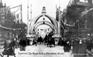 View: y00675 Decorative arch on Fitzwilliam Street at junction of Chester Street, to celebrate the royal visit of King Edward VII and Queen Alexandra