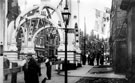 View: y00676 Decorative arch on Fitzwilliam Street at junction of Chester Street, to celebrate the royal visit of King Edward VII and Queen Alexandra