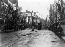 View: y00724 High Street looking towards Cole's Corner, decorated for royal visit of King Edward VII and Queen Alexandra