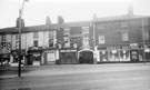 Premises on Button Lane decorated for the Coronation, Moorhead in foreground, No. 2 Moorhead, Roberts Brothers Ltd., general drapers, Nos. 18 - 22 Button Lane, Angel Inn, No. 24 Evans and Green, confectioners, No 26, Skidmores, pork butchers