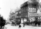 High Street before road widening, premises include Nos. 10 - 14 William Foster and Son Ltd., tailors, Nos. 16 - 18 Charles Tinker, boot manufacturer, No. 22 Edward Brown, goldsmith, No 26, Grand Clothing Hall Co., tailors