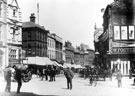 High Street from 'Coles Corner', Nos. 10 - 14 William Foster and Son, tailors, right, premises on left include No. 7 London City and Midland Bank, Nos. 9 - 11 Sheffield Goldsmiths' Co., silversmiths and Castle Chambers, left (note water cart, left)