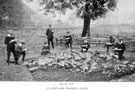 An open-air drawing class, part of a series of practical open-air studies in Elementary Science, Nature Study, Drawing and Geometry by Headmaster J. Eaton Feasey, using pupils from Nethergreen School also known as Ranmoor School)