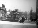 Tram Nos. 180 and 197, High Street looking towards Commercial Street including Canada House (Sheffield Gas Company offices) and Birmingham District and Counties Banking Co. (with domed roof on right). Fitzalan Market Hall on left.