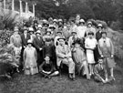 Staff from Sheffield Photo Co. and Photo Finishers, on an excursion to Alton Towers. Group includes Frank Mottershaw, seated