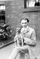 Unidentified man and pet dog