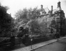 Entrance from Norfolk Street to St. Pauls Churchyard with the Town Hall in the background, Cheney Row is between the end of the churcyard and the Town Hall