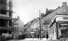 Nos. 21 Blake's Medical Store Ltd. and 20-22 Carlton Restaurant, Change Alley looking towards Norfolk Street